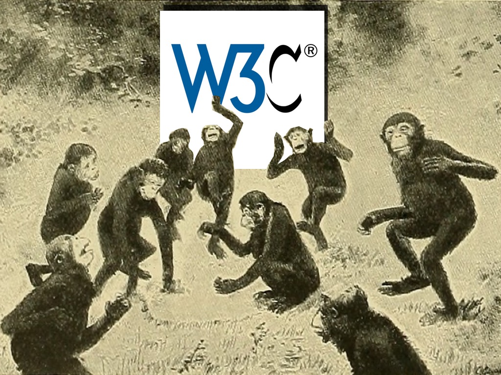 a group of apes in front of a W3C monolith