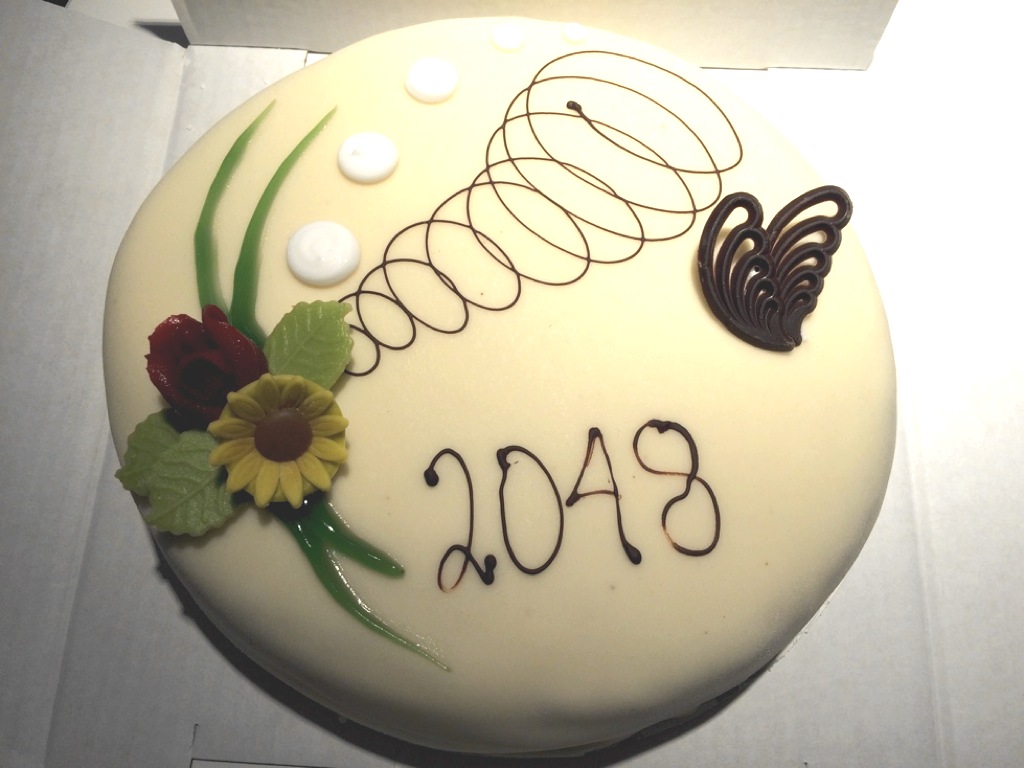 a cake with '2048' iced on it